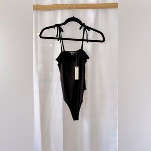 Olivaceous Black Thong Bodysuit. Size Medium. NWT.